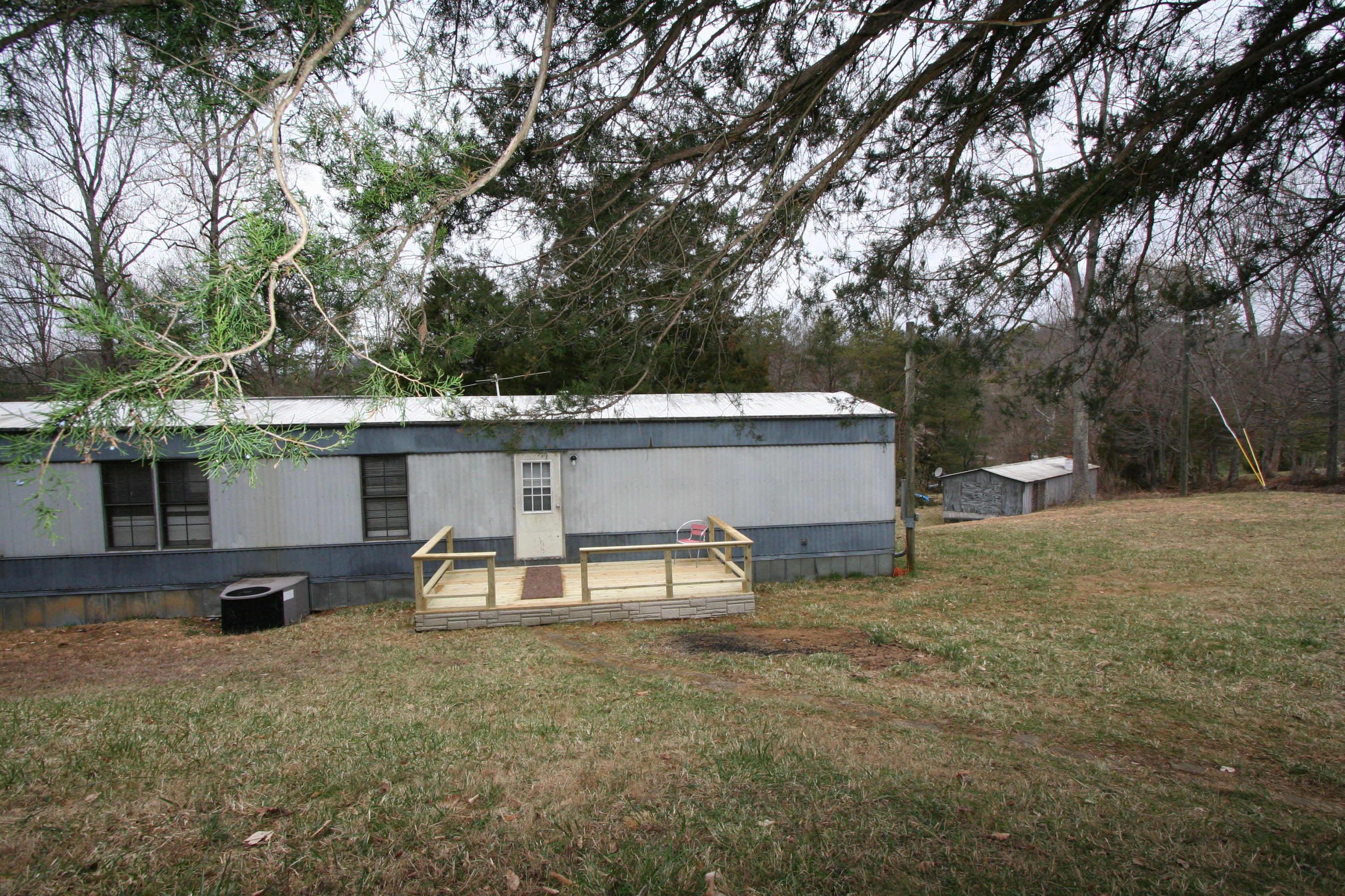 1172 Bull Run Road Luttrell, TN 37779 - Photo 6 of 21 Rear Deck & Heat Pump