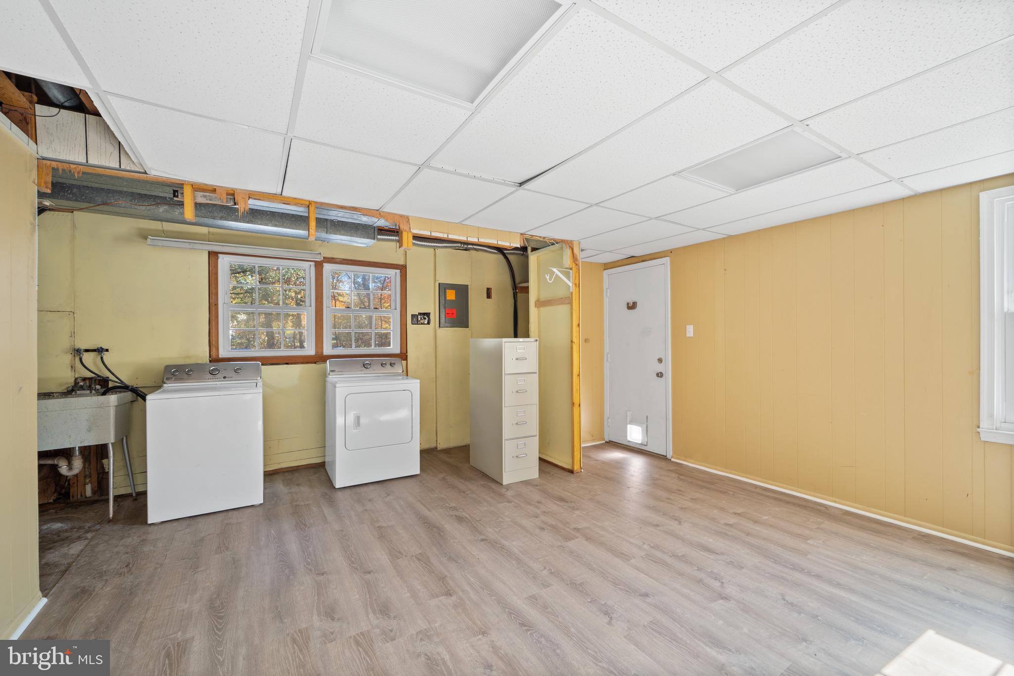 2335 Rosedown Drive Reston, VA 20191 - Photo 32 of 36 Utility Room w/Washer/Dryer & Door out to Sideyar