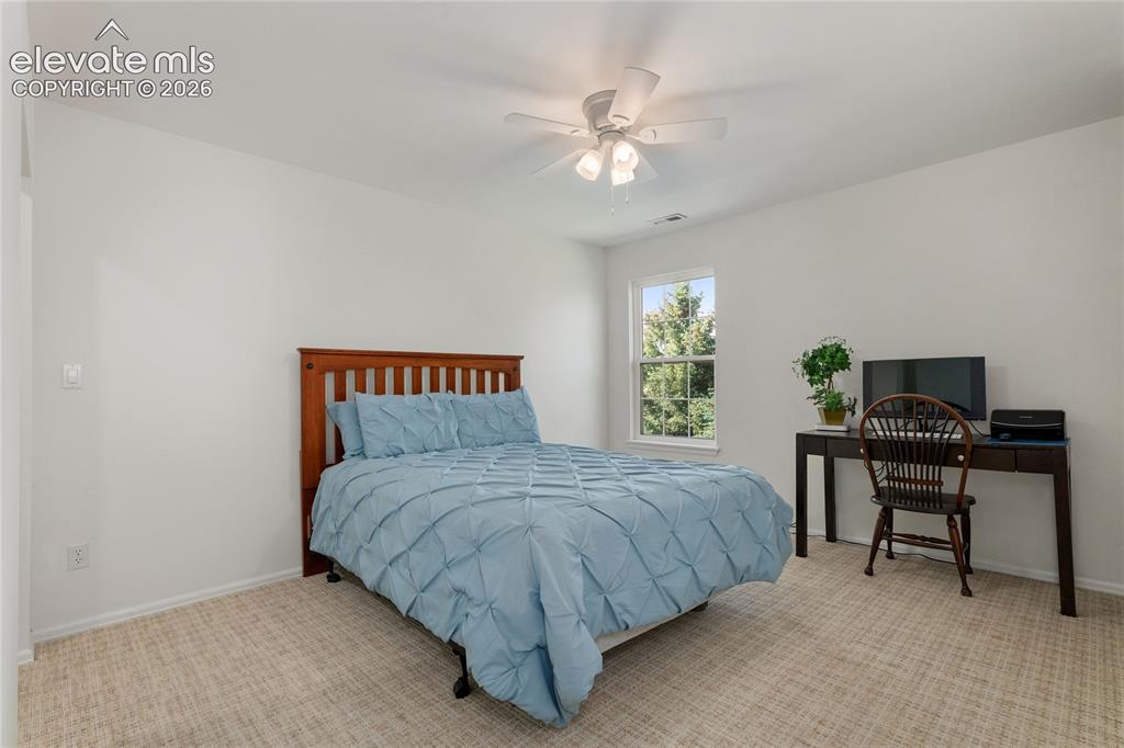 5575 Butler Court Colorado Springs, CO 80918 - Photo 32 of 42 Bedroom #3 upstairs