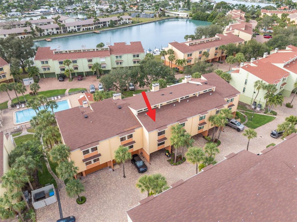 529 Sandy Hook Road Treasure Island, FL 33706 - Photo 48 of 55 an aerial view of a house with a lake view