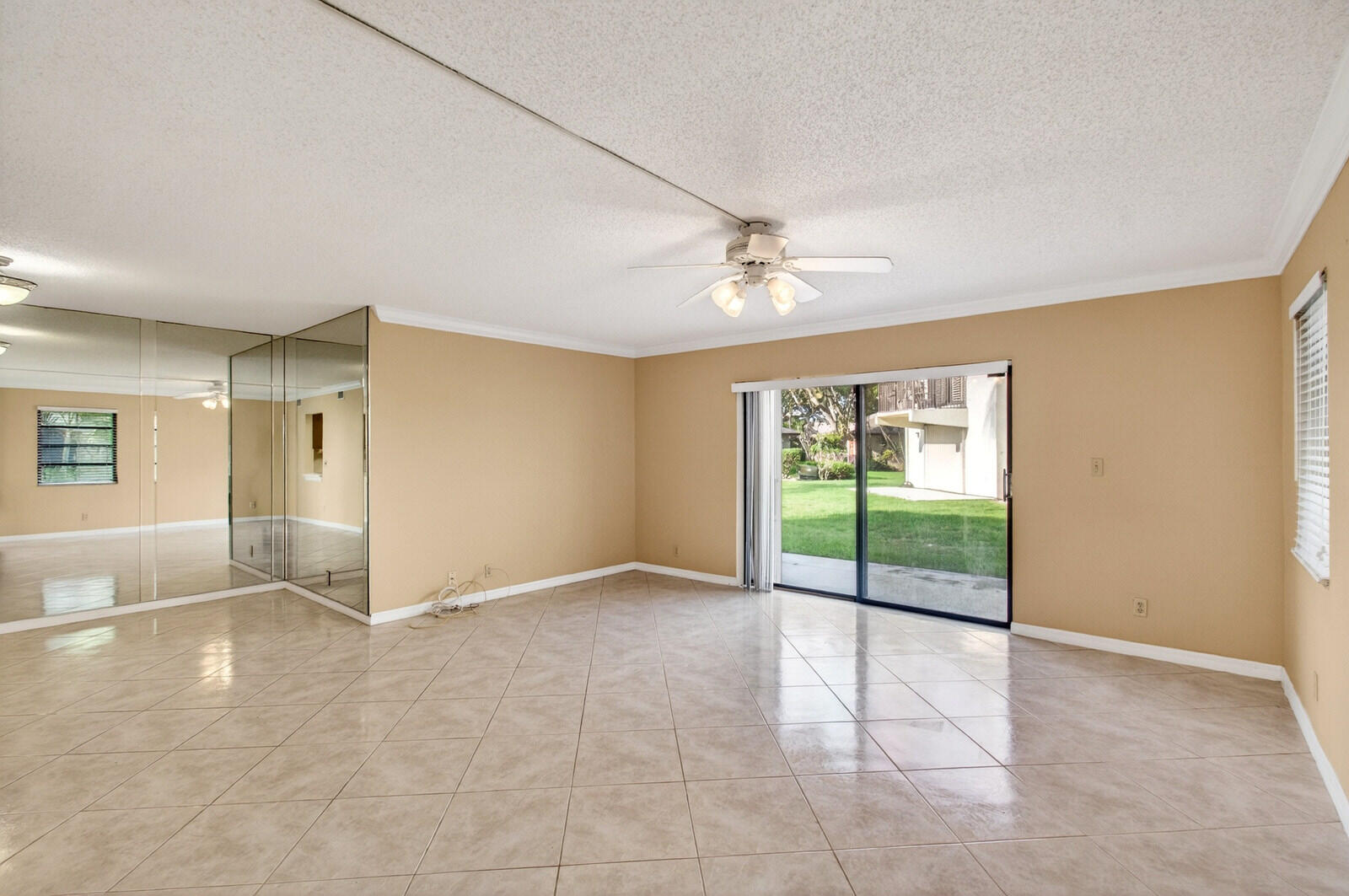 3951 Northeast 19th Road, Unit 1701 Pompano Beach, FL 33064 - Photo 26 of 82 an empty room with windows and closet