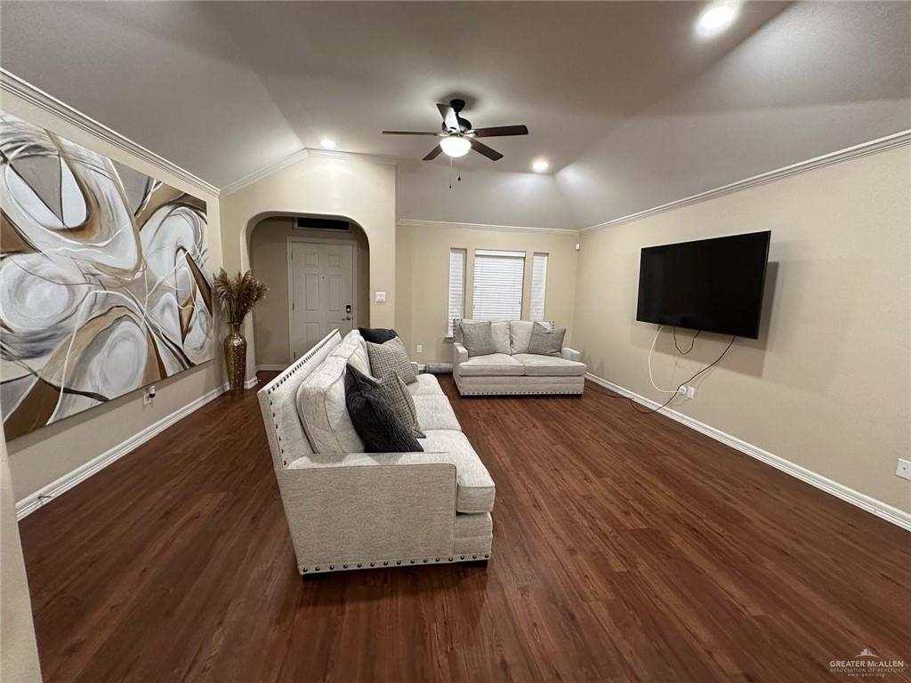 4608 Robin Avenue McAllen, TX 78504 - Photo 6 of 12 Spacious living area featuring rich wood-finish flooring and a vaulted ceiling with a ceiling fan