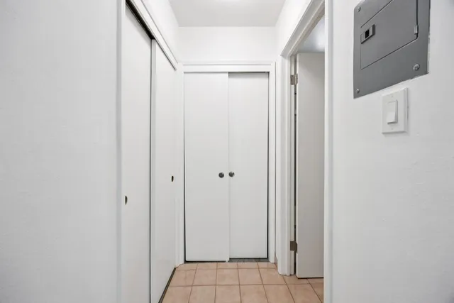 a view of a chairs and table in a patio