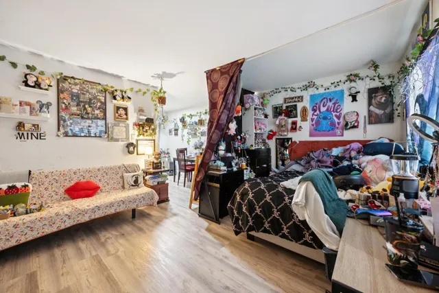 a kitchen with stainless steel appliances and cabinets