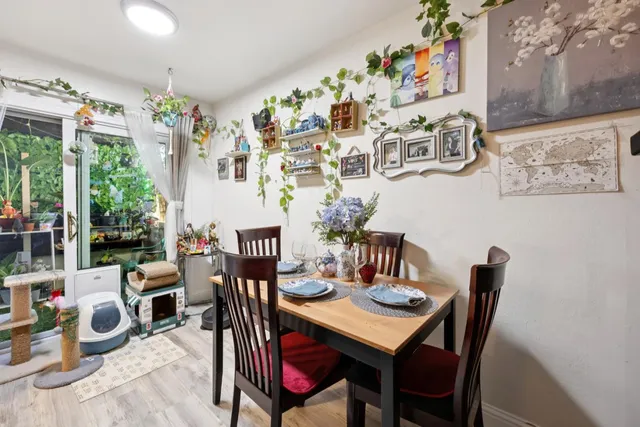 a bed room with a bed and a dresser