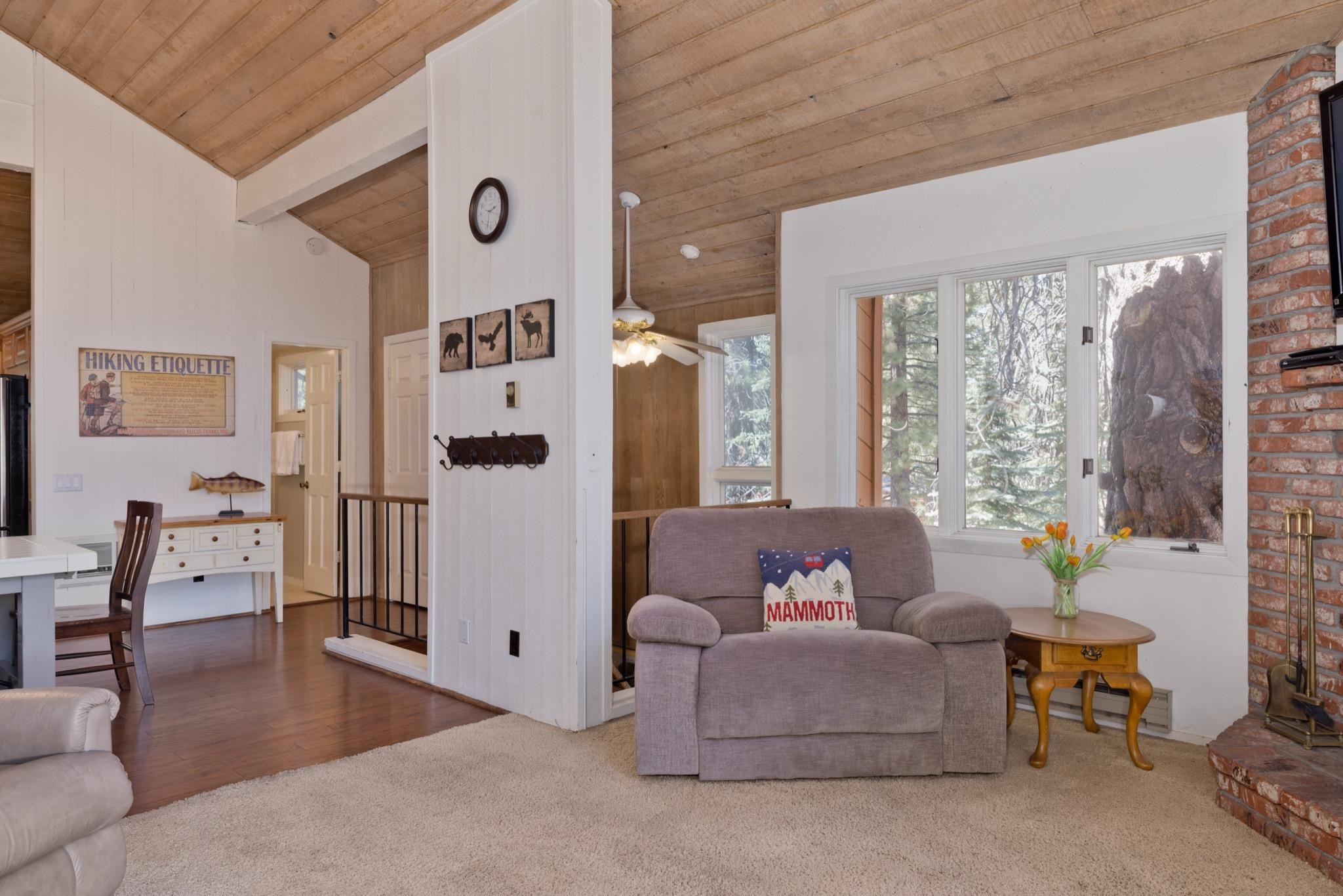 3392 Chateau Road, Unit 29 Mammoth Lakes, CA 93546 - Photo 6 of 30 Vaulted wood-finish ceilings and exposed beams create an airy ambiance