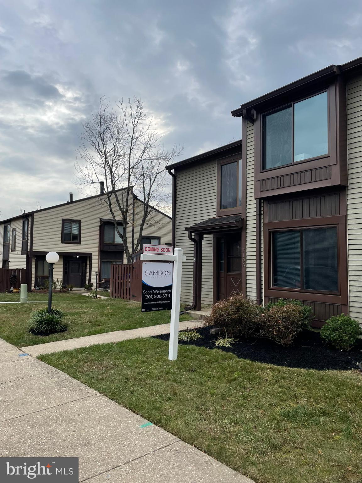 a house view with a garden space
