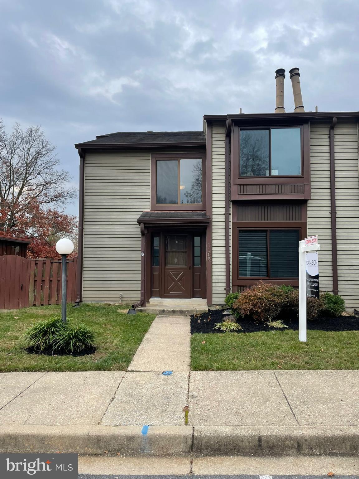 7105 Split Rail Lane Laurel, MD 20707 - Photo 2 of 12 a front view of a house with garden