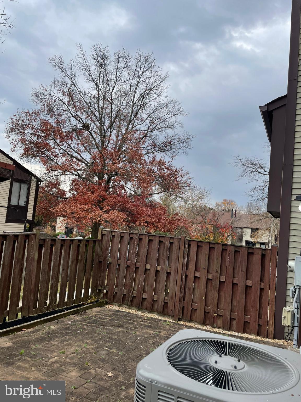 7105 Split Rail Lane Laurel, MD 20707 - Photo 3 of 12 a view of roof deck with wooden fence