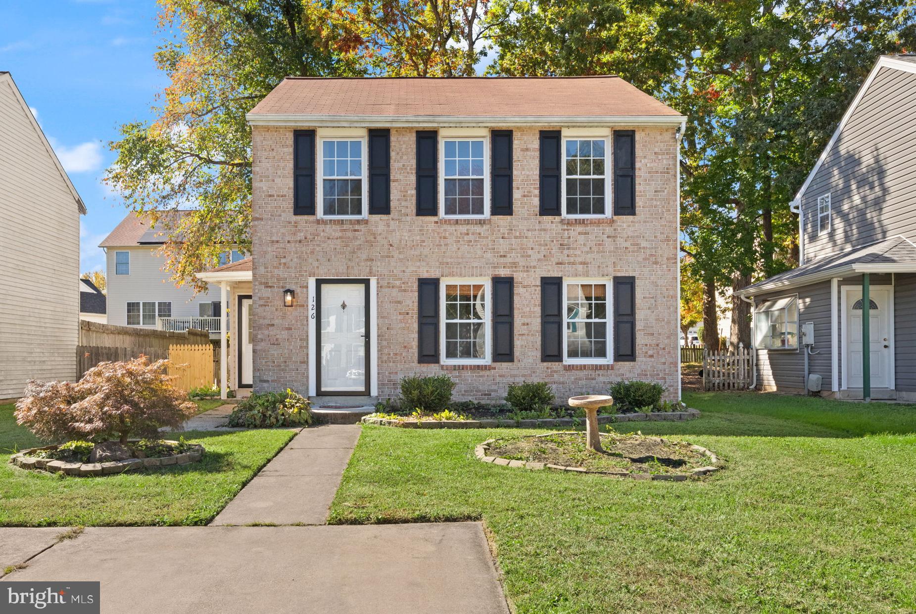 126 Laburnum Road Edgewood, MD 21040 - Photo 1 of 30 a front view of a house with garden and trees