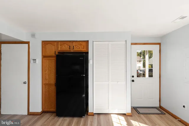 a kitchen with granite countertop a sink and a stove