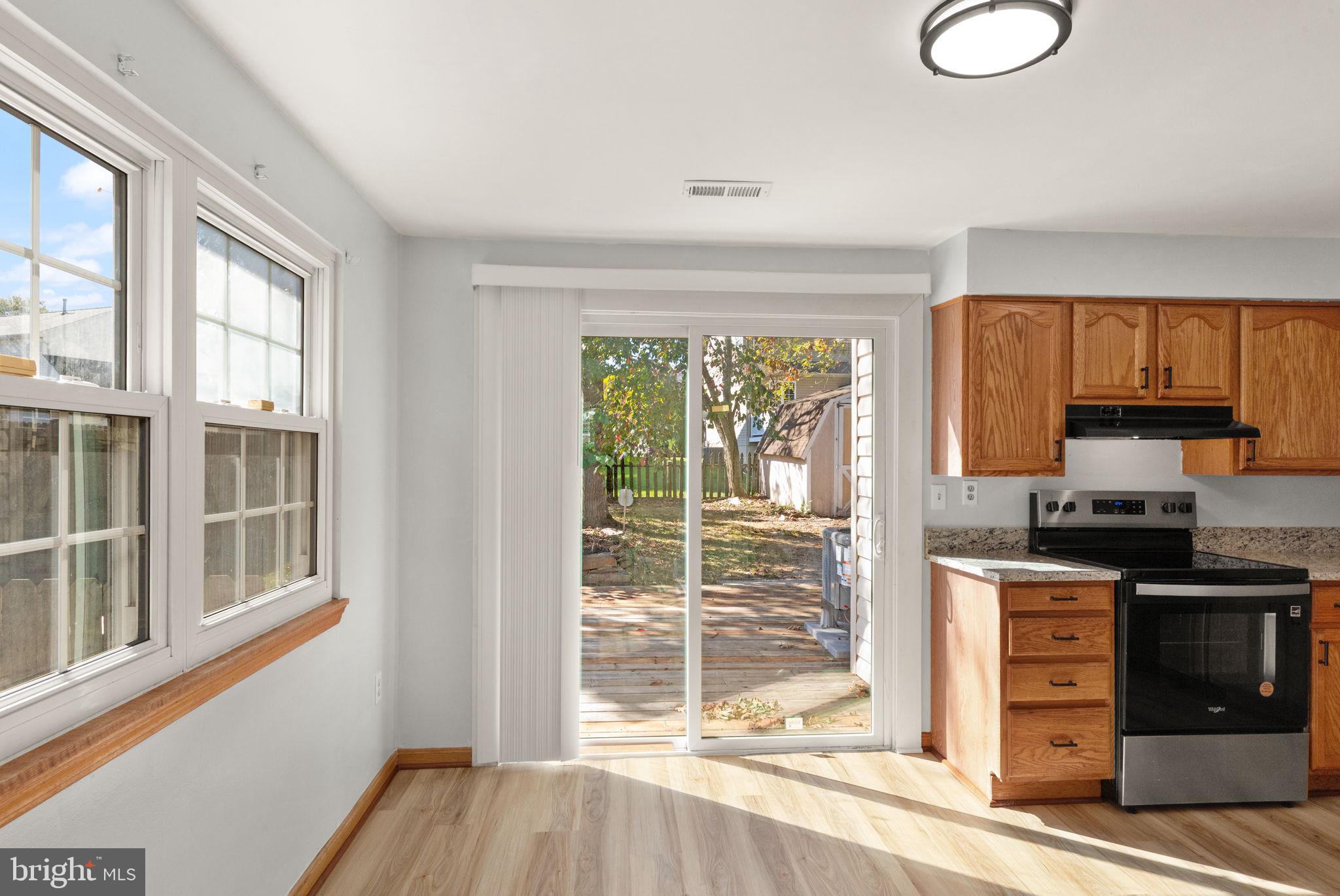 126 Laburnum Road Edgewood, MD 21040 - Photo 11 of 30 a kitchen with granite countertop a stove a sink and a cabinets
