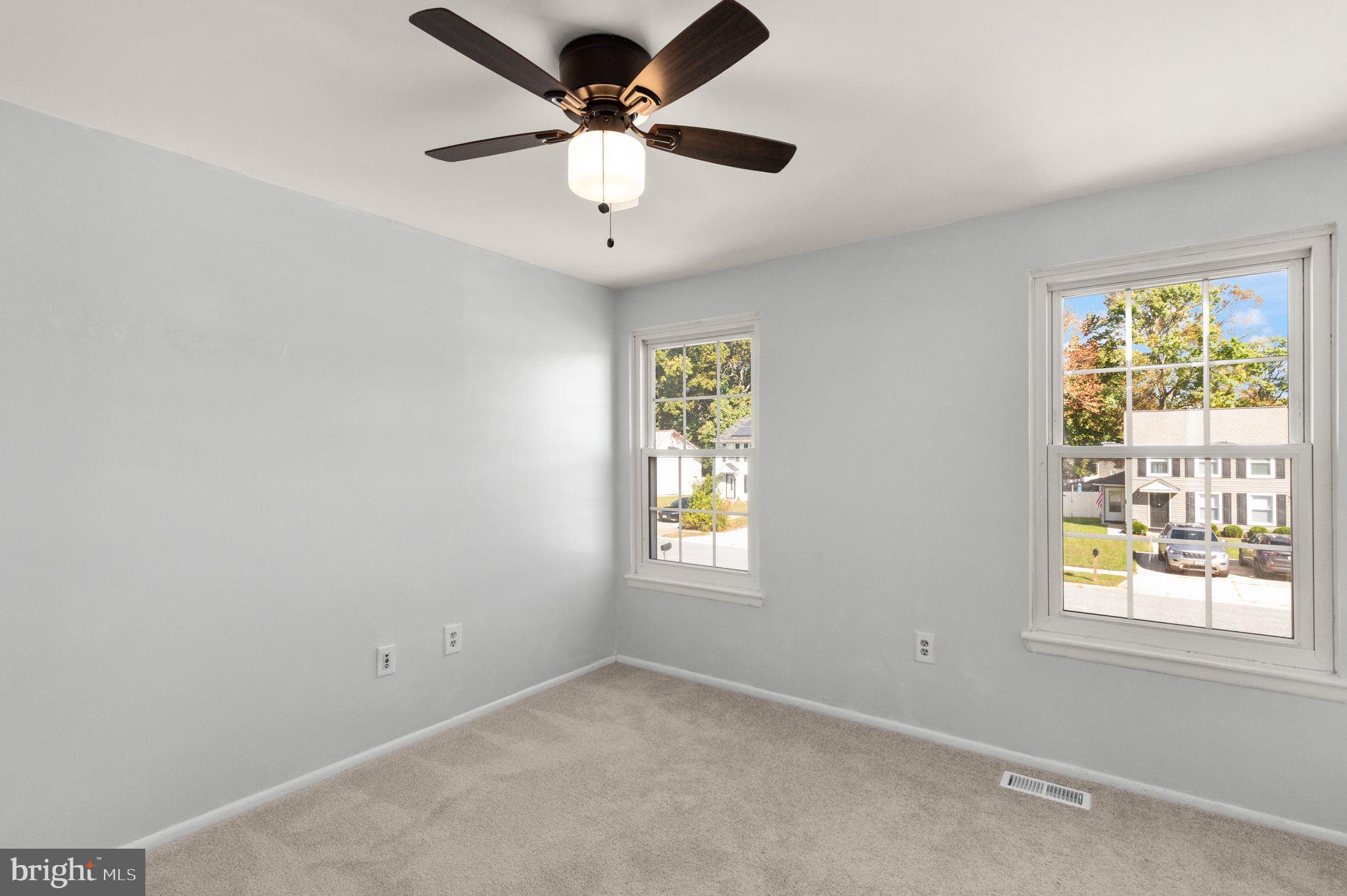 126 Laburnum Road Edgewood, MD 21040 - Photo 18 of 30 an empty room with windows and fan