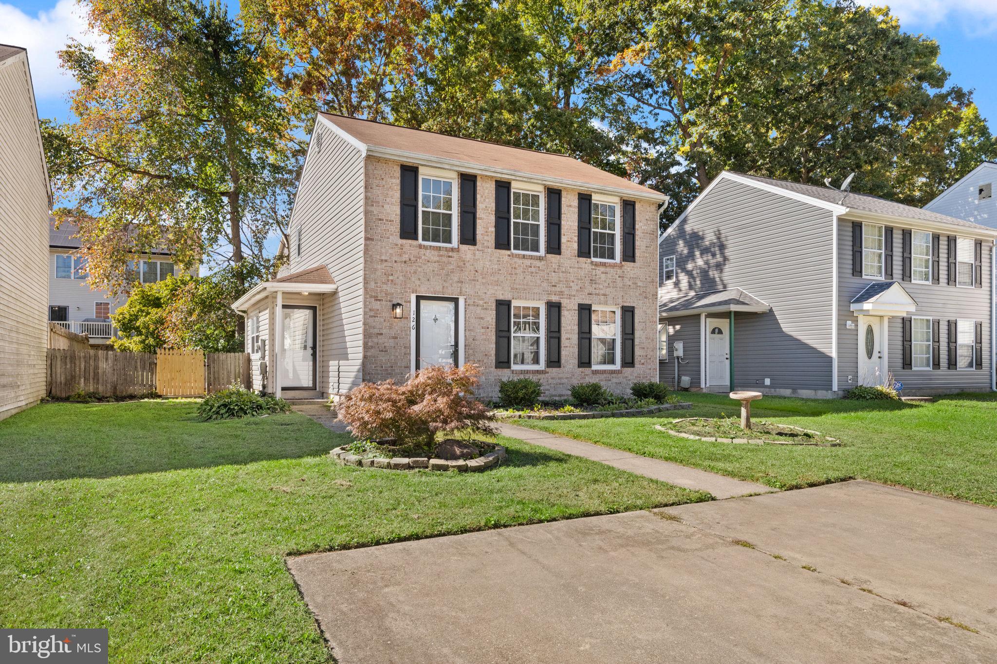 126 Laburnum Road Edgewood, MD 21040 - Photo 2 of 30 a front view of a house with a yard and trees