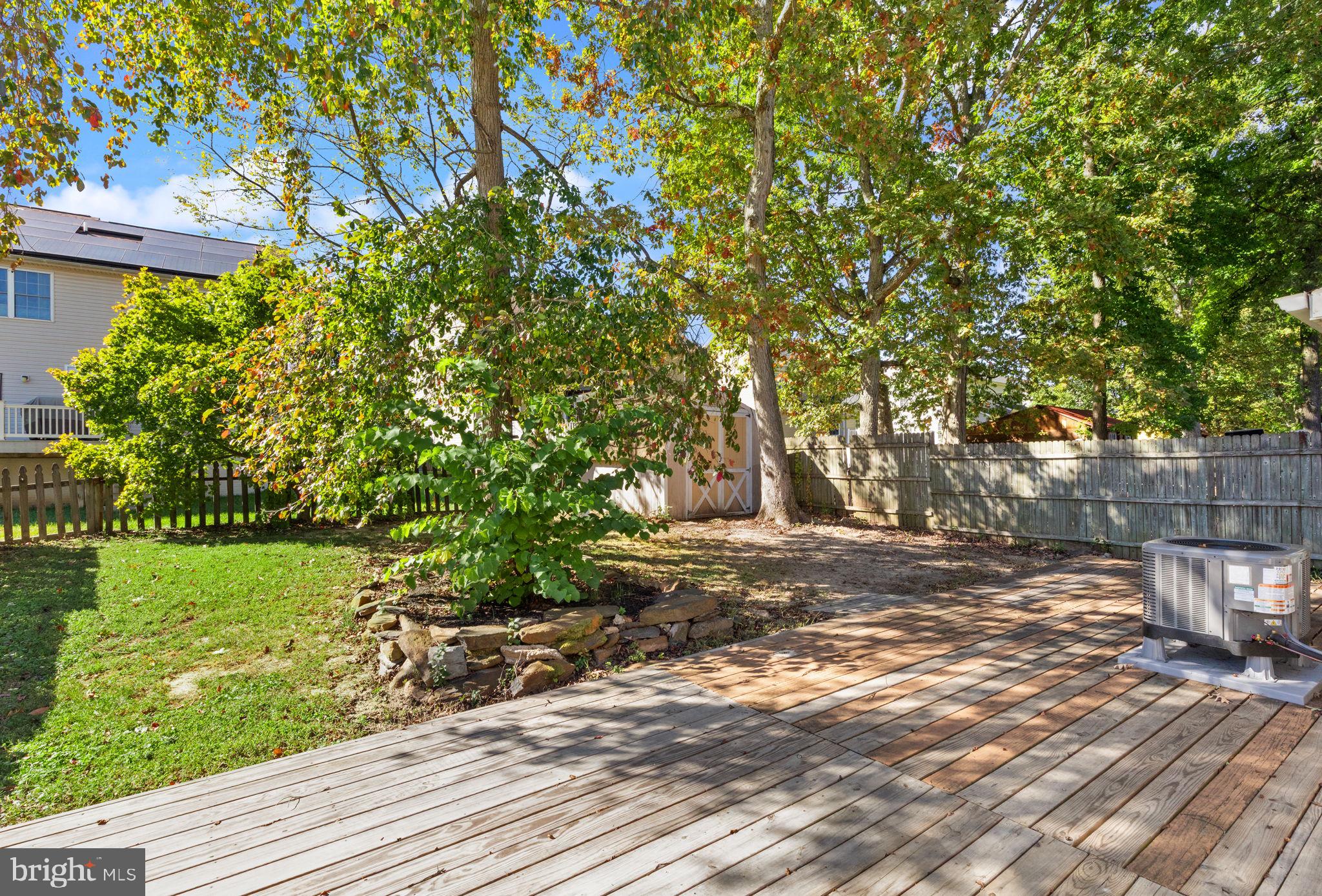 126 Laburnum Road Edgewood, MD 21040 - Photo 22 of 30 a view of a yard with plants and trees