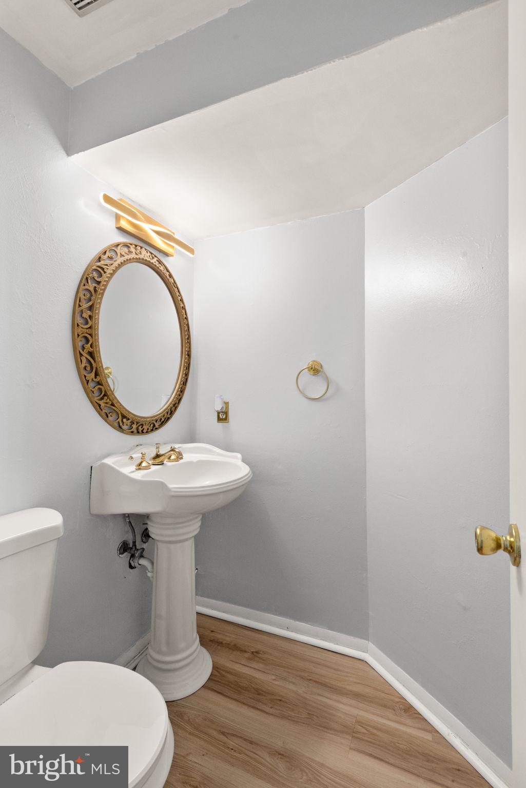 126 Laburnum Road Edgewood, MD 21040 - Photo 4 of 30 a bathroom with a sink and a mirror