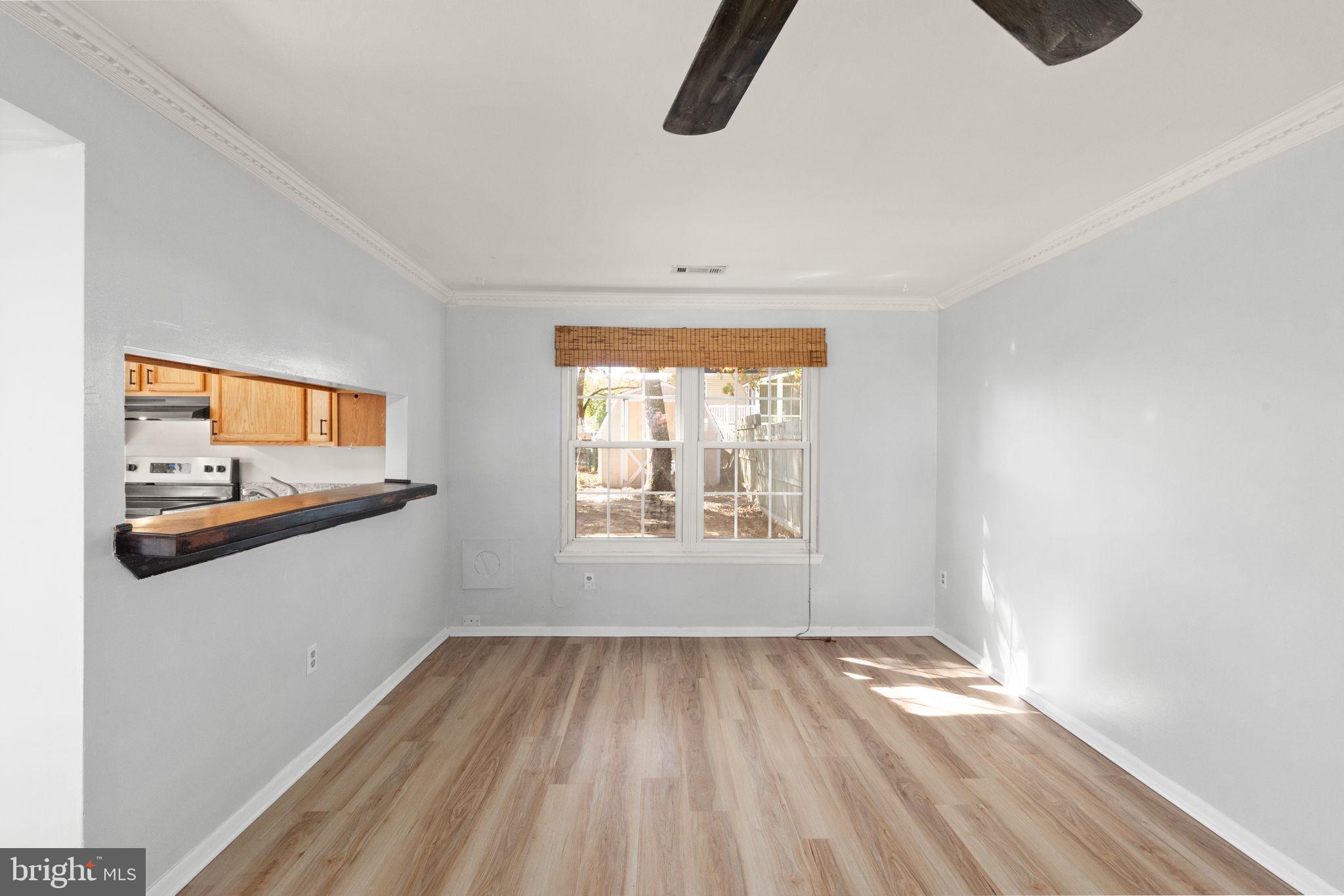 126 Laburnum Road Edgewood, MD 21040 - Photo 30 of 30 wooden floor in an empty room with a window