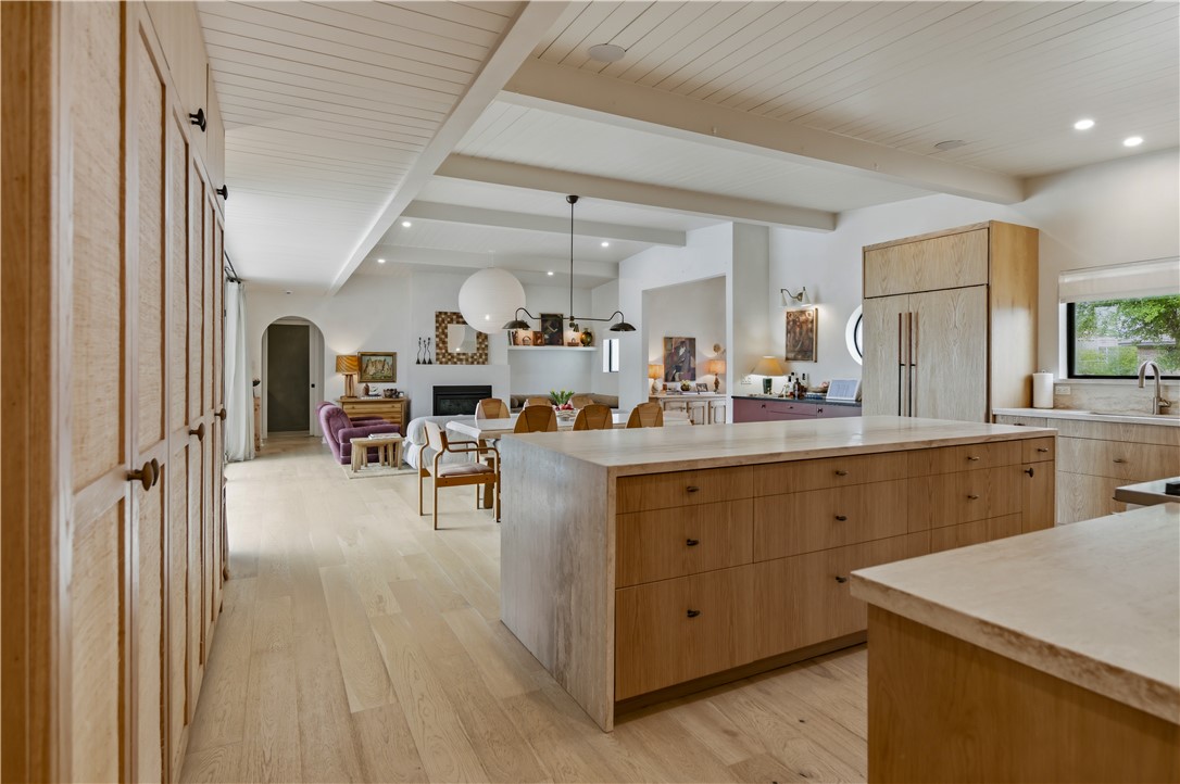 805 Vine Street Bryan, TX 77802 - Photo 16 of 45 Waterfall travertine counter tops and 9 foot island