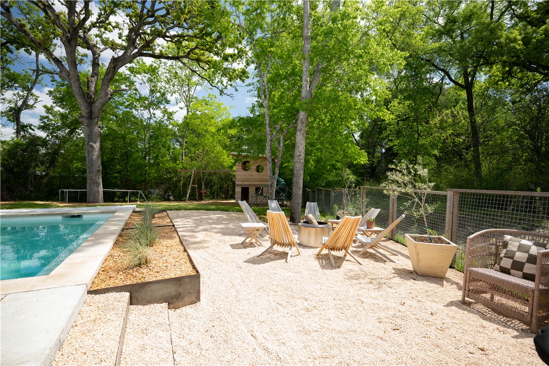 805 Vine Street Bryan, TX 77802 - Photo 39 of 45 Courtyard just off the back side of the pool alongside the creek at the rear of the property