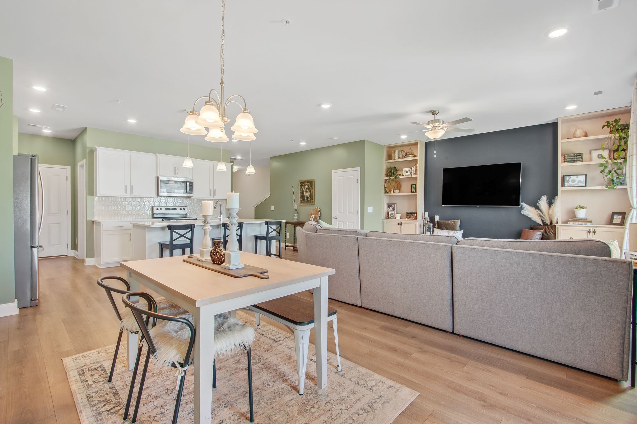 1012 June Wilde Ridge Spring Hill, TN 37174 - Photo 16 of 49 a large kitchen with a table and chairs