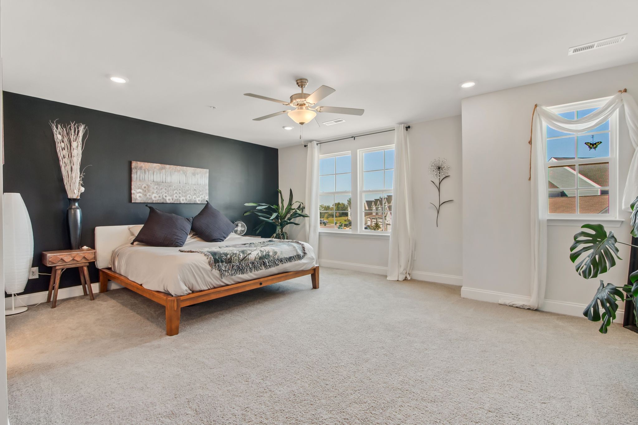 1012 June Wilde Ridge Spring Hill, TN 37174 - Photo 20 of 49 a bedroom with a bed chandelier and a window