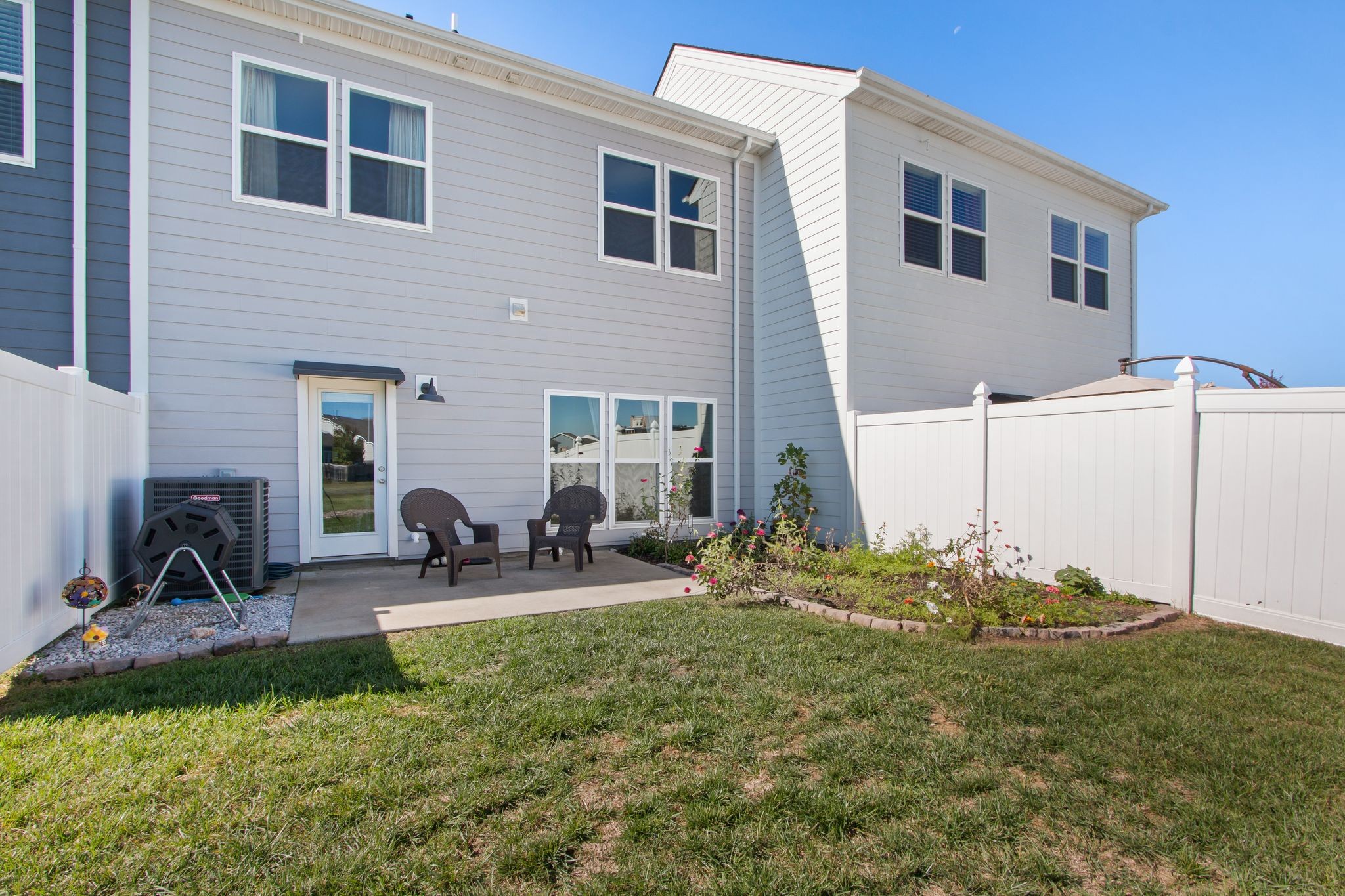 1012 June Wilde Ridge Spring Hill, TN 37174 - Photo 30 of 49 a group of people sitting in front of a house