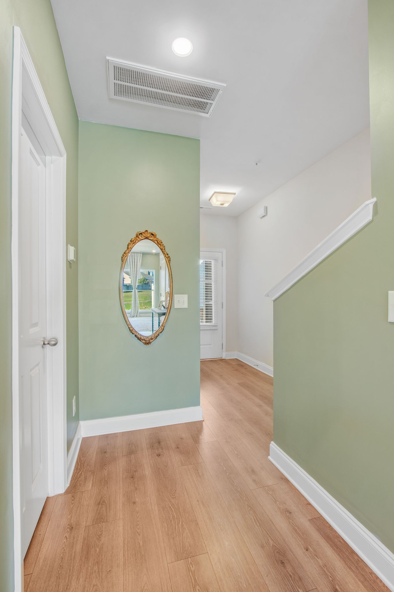 1012 June Wilde Ridge Spring Hill, TN 37174 - Photo 5 of 49 a view of a room with wooden floor and white wall