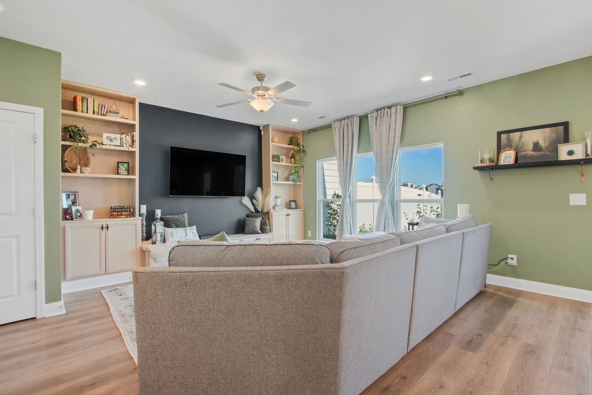 1012 June Wilde Ridge Spring Hill, TN 37174 - Photo 7 of 49 a living room with furniture and a flat screen tv