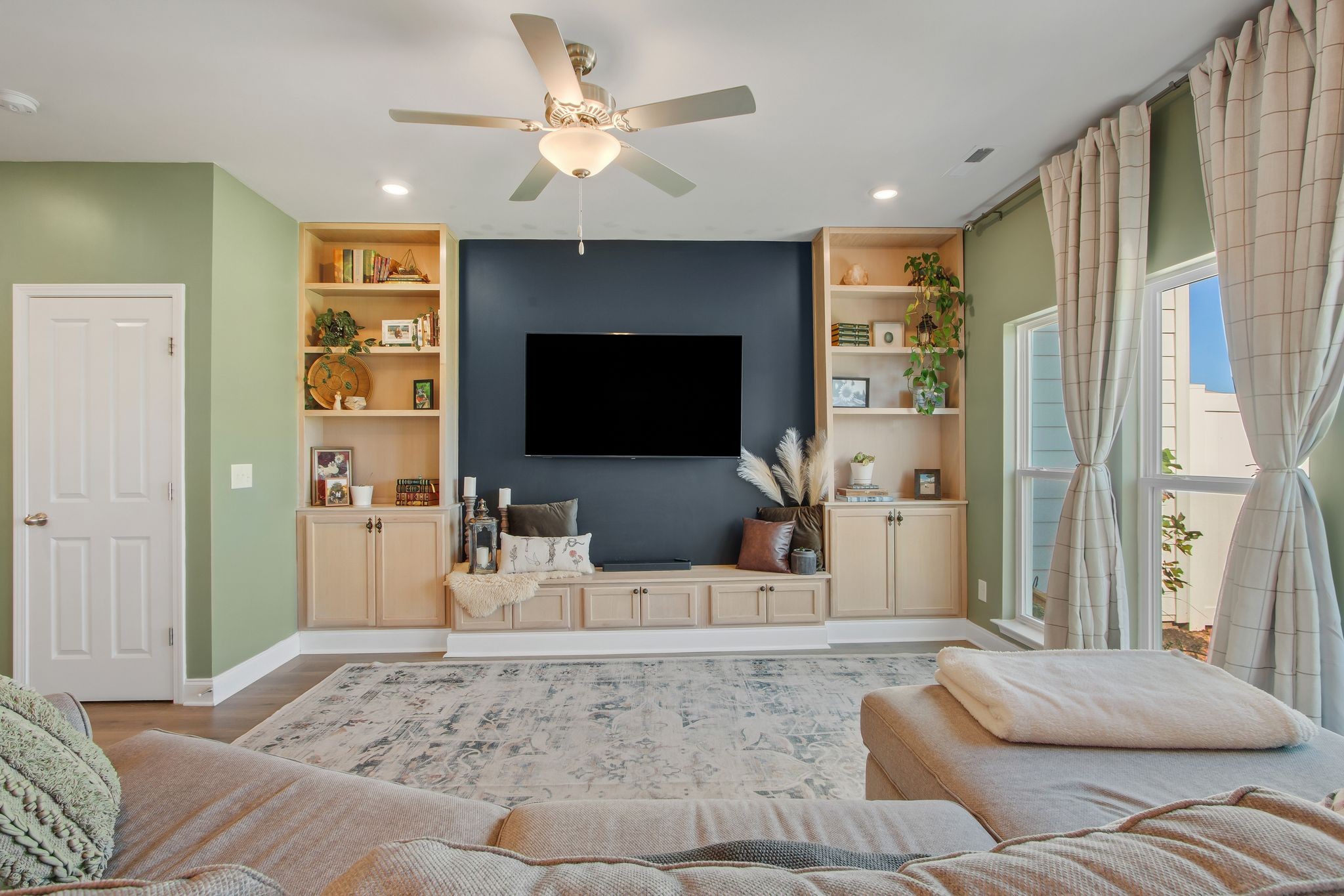 1012 June Wilde Ridge Spring Hill, TN 37174 - Photo 8 of 49 a living room with furniture and a flat screen tv