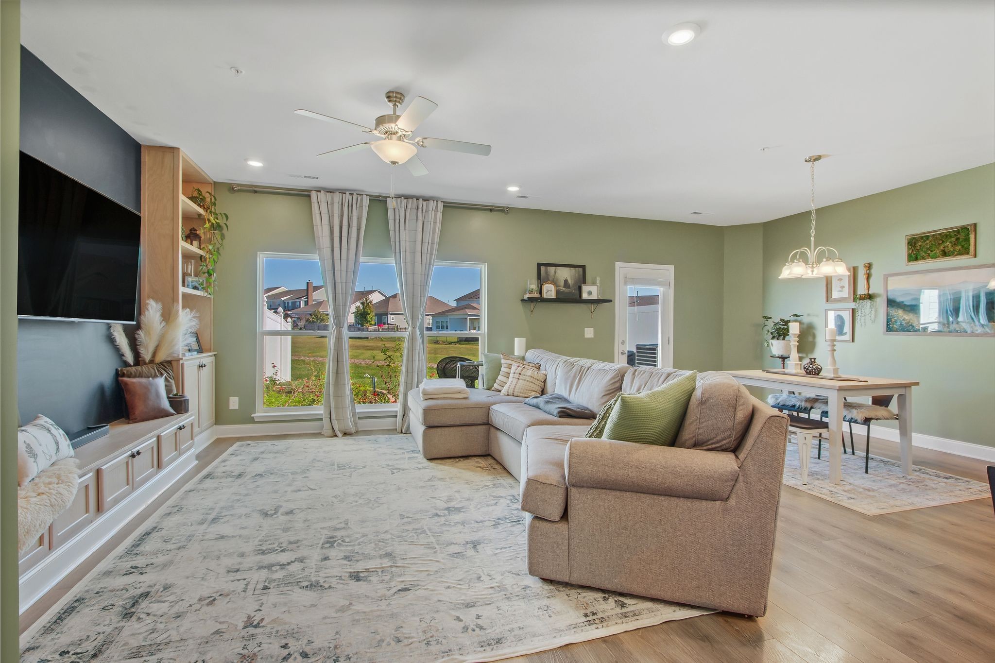 1012 June Wilde Ridge Spring Hill, TN 37174 - Photo 9 of 49 a living room with furniture and a flat screen tv