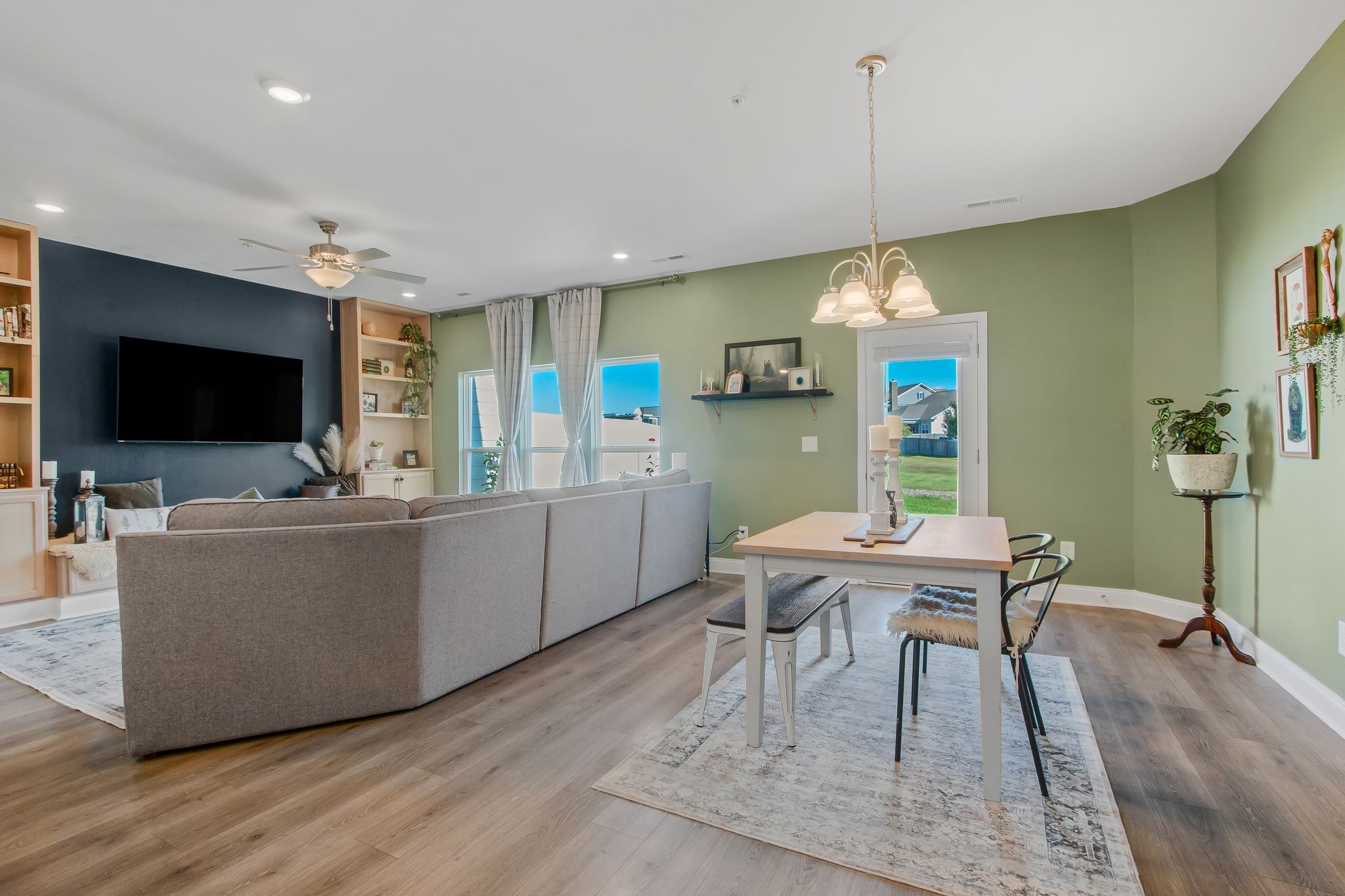 1012 June Wilde Ridge Spring Hill, TN 37174 - Photo 10 of 49 a view of a dining room with furniture window and wooden floor