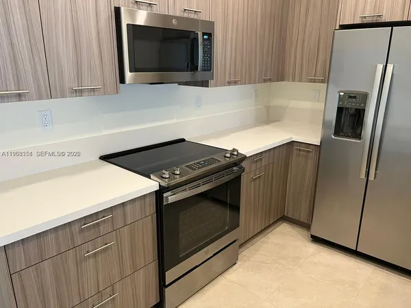 a bathroom with a sink toilet and mirror