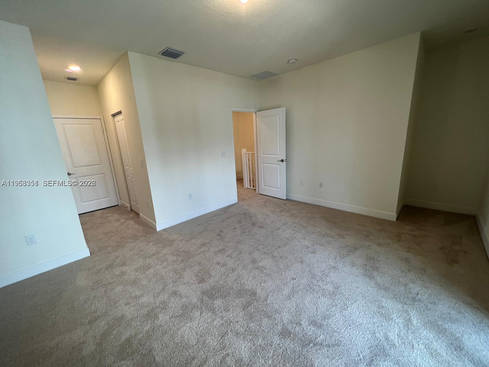 4622 Northwest 83rd Path Doral, FL 33166 - Photo 7 of 13 an empty room with a fireplace