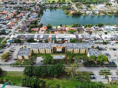606 West 81st Street, Unit 120 Hialeah, FL 33014 - Photo 14 of 14 an aerial view of a house with a lake view