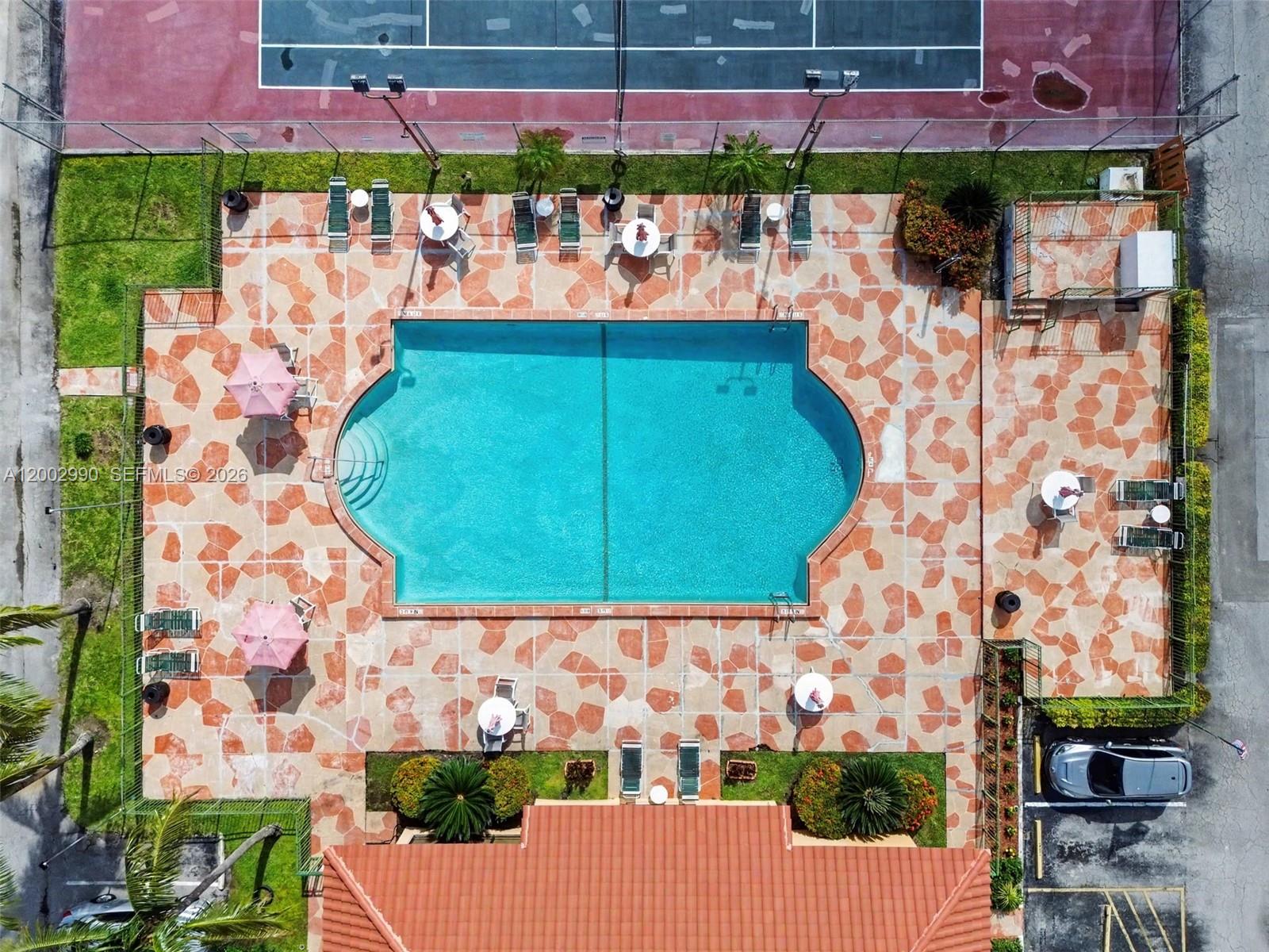 606 West 81st Street, Unit 120 Hialeah, FL 33014 - Photo 6 of 14 an outdoor space view with swimming pool