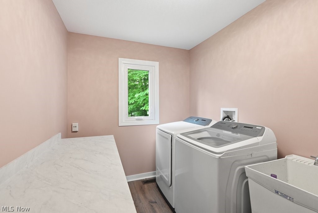 2323 Call Road Stow, OH 44224 - Photo 24 of 42 laundry room featuring a single window, a utility sink, and wood-finish flooring