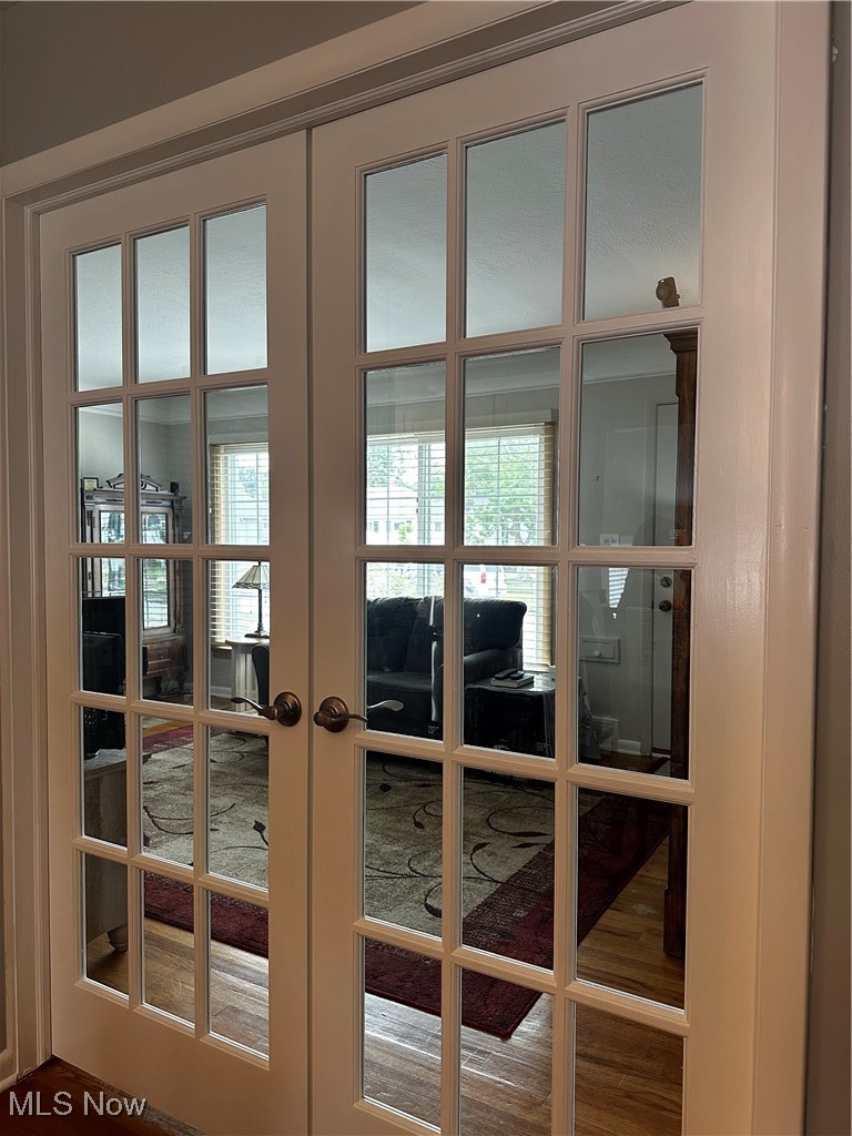 739 Sterling Road Wickliffe, OH 44092 - Photo 9 of 27 Doorway to outside featuring hardwood / wood-style floors and french doors