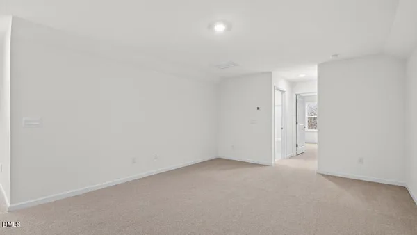 a room with a book shelf