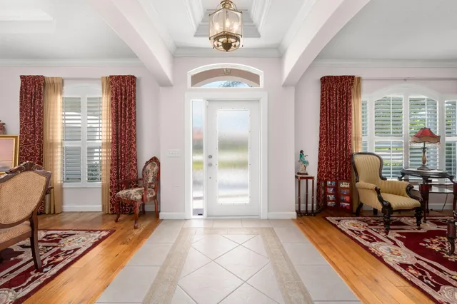 a view of a livingroom with furniture and windows
