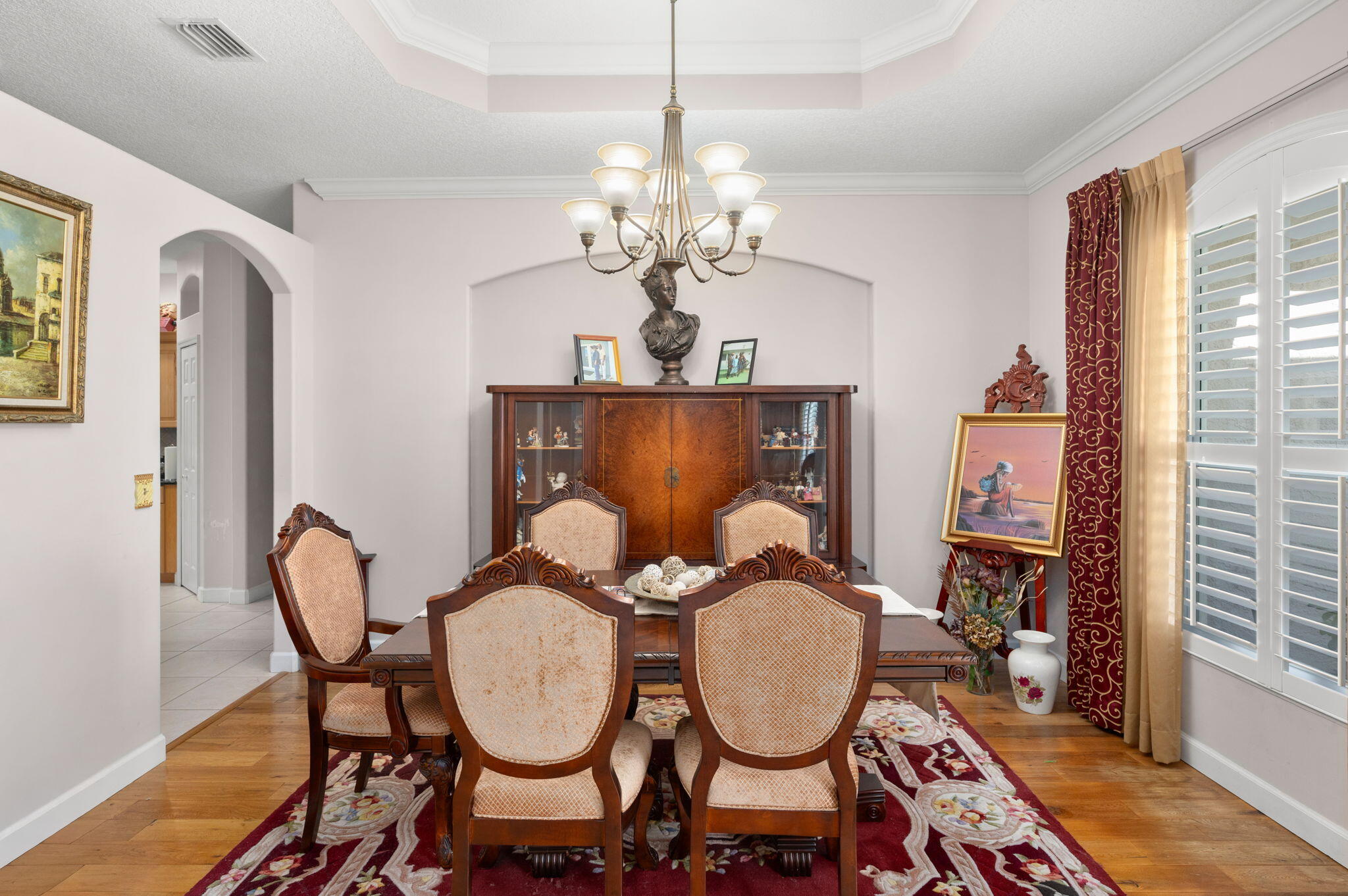 1545 Southwest Mockingbird Circle Port St. Lucie, FL 34986 - Photo 6 of 24 a view of a room with furniture and chandelier