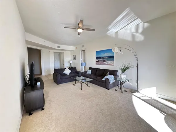 a kitchen with a sink cabinets and window