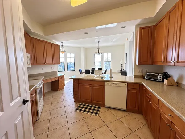 a bathroom with a toilet a sink and shower