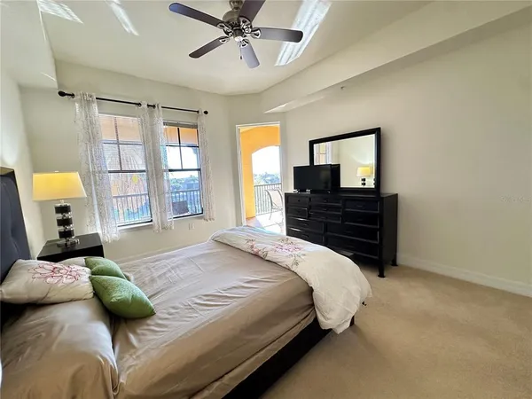a view of a balcony with a table and chairs