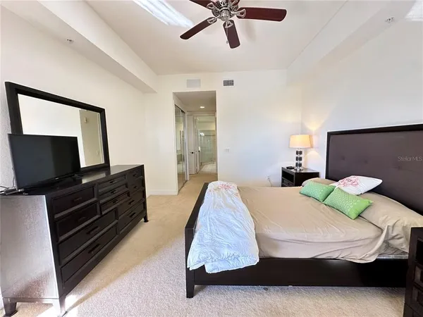 a view of a chairs and table in the balcony