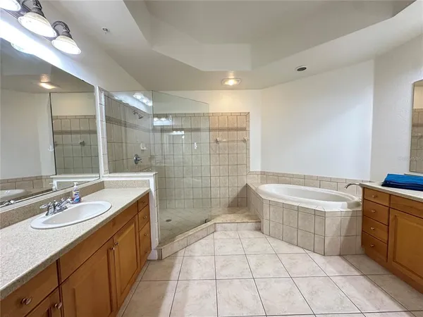 a view of balcony with a dining table and a stove