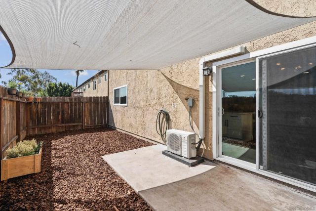 a view of a swimming pool with outdoor seating