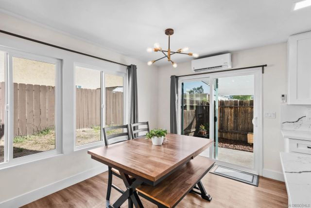 a view of a livingroom with furniture and window