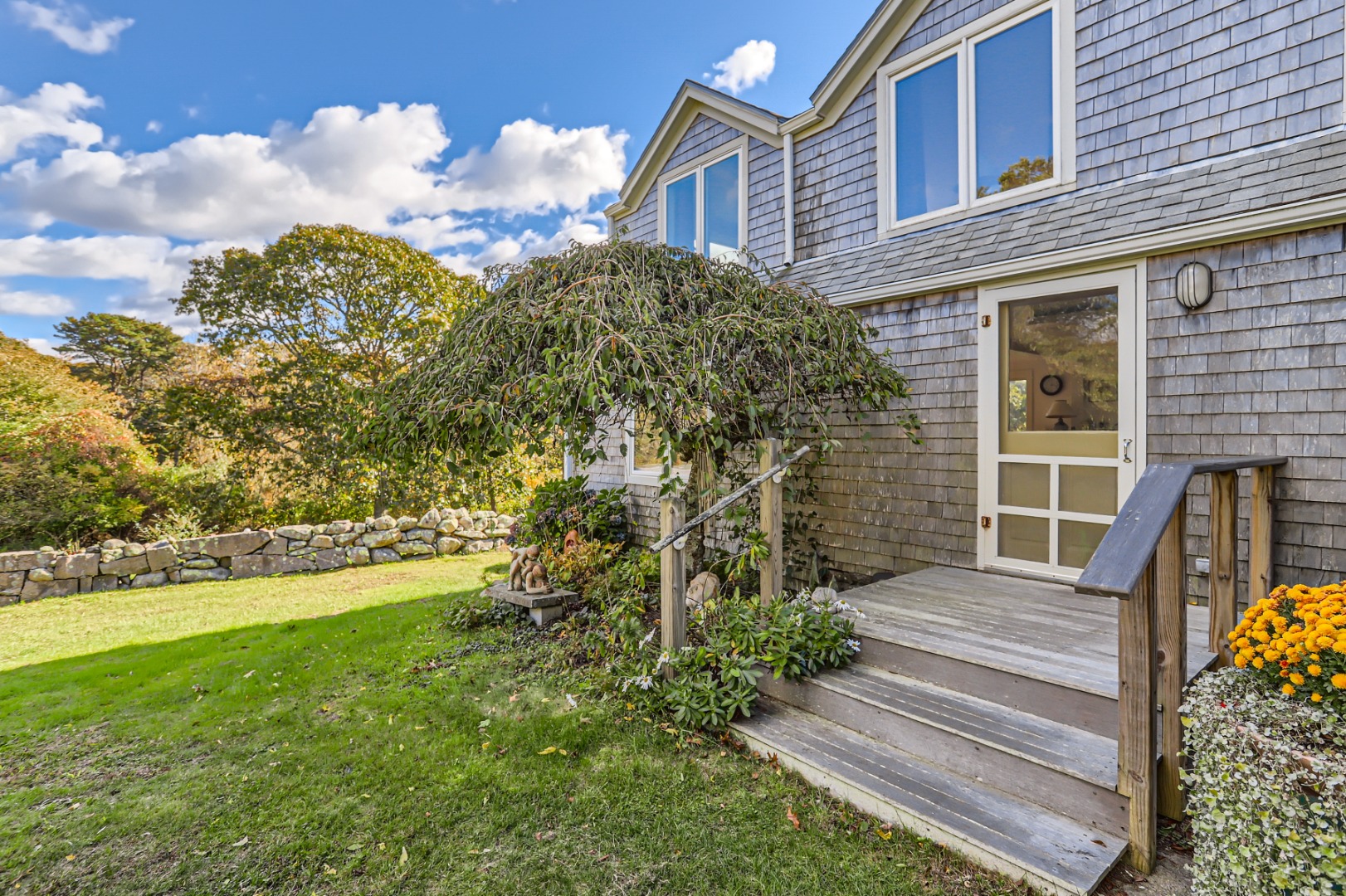76 State Road Chilmark, MA 02535 - Photo 18 of 79 a view of a house with backyard and garden