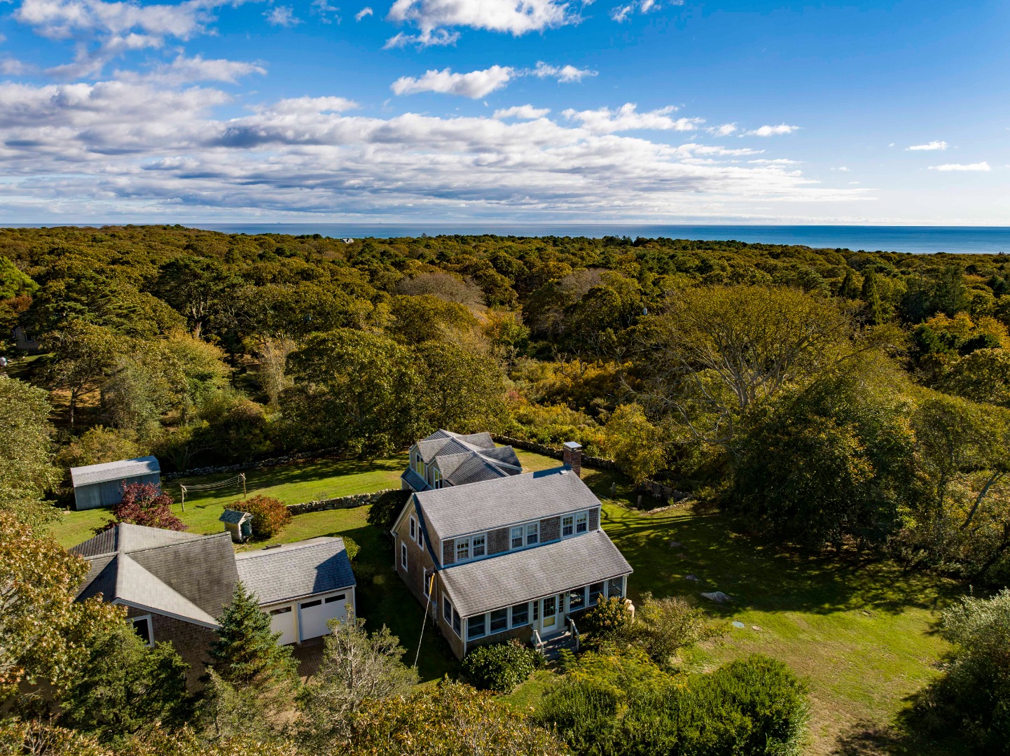76 State Road Chilmark, MA 02535 - Photo 2 of 79 an aerial view of a house with a yard