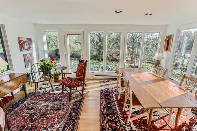 76 State Road Chilmark, MA 02535 - Photo 24 of 79 a living room with furniture and a large window